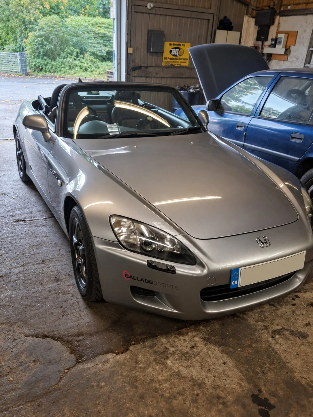 Silver Honda S2000 in a workshop
