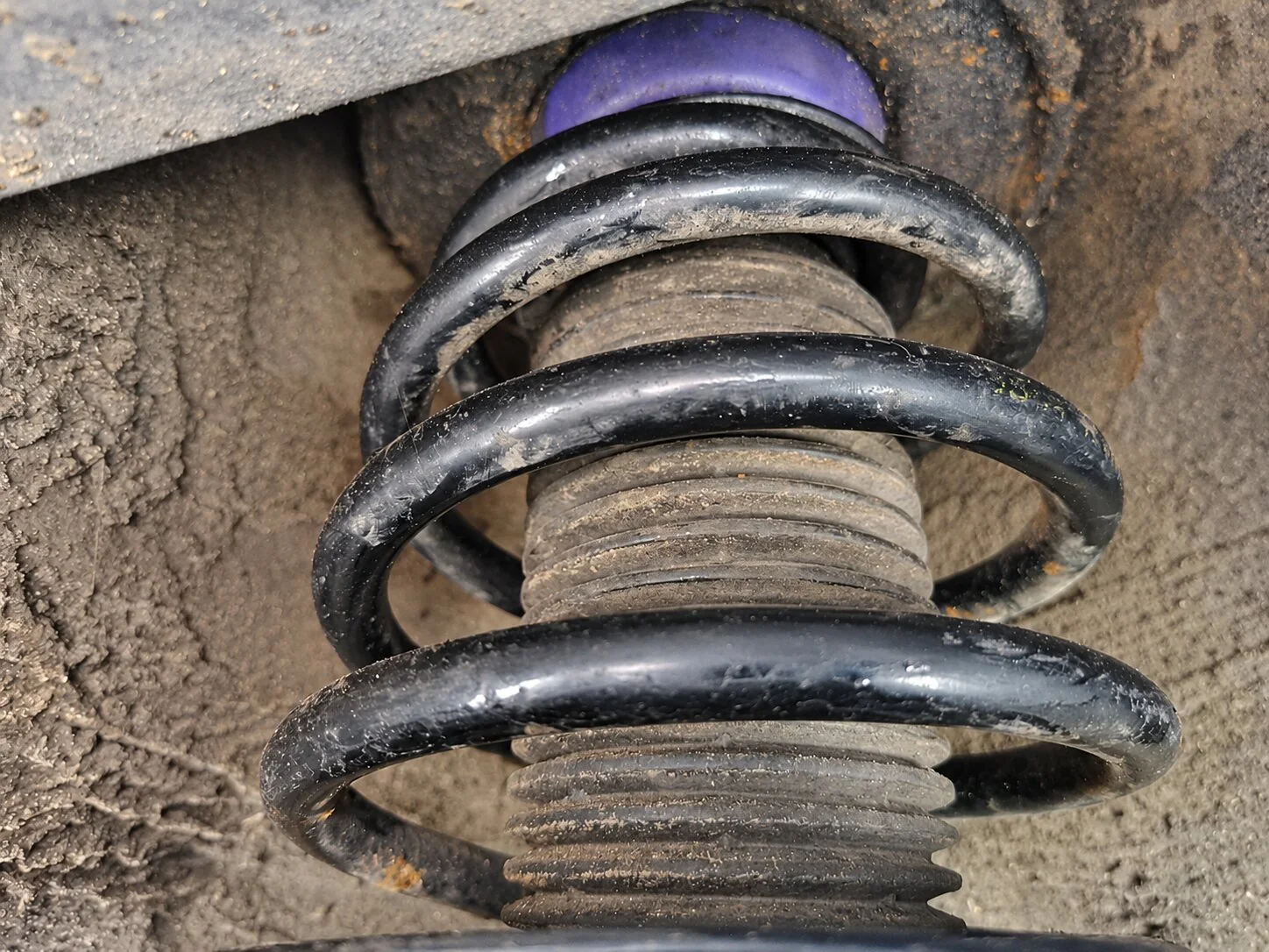 Close-up of a suspension spring and damper